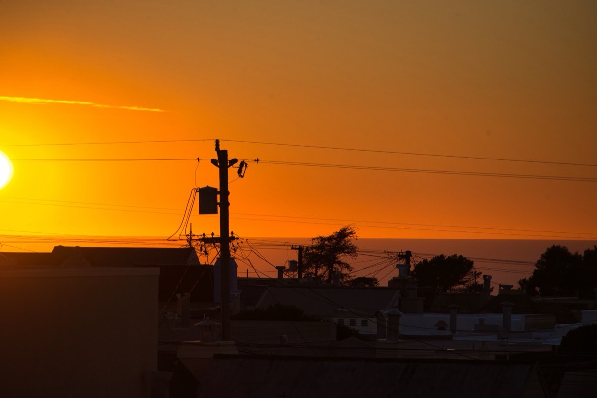 Sunset over the ocean seen from the beach